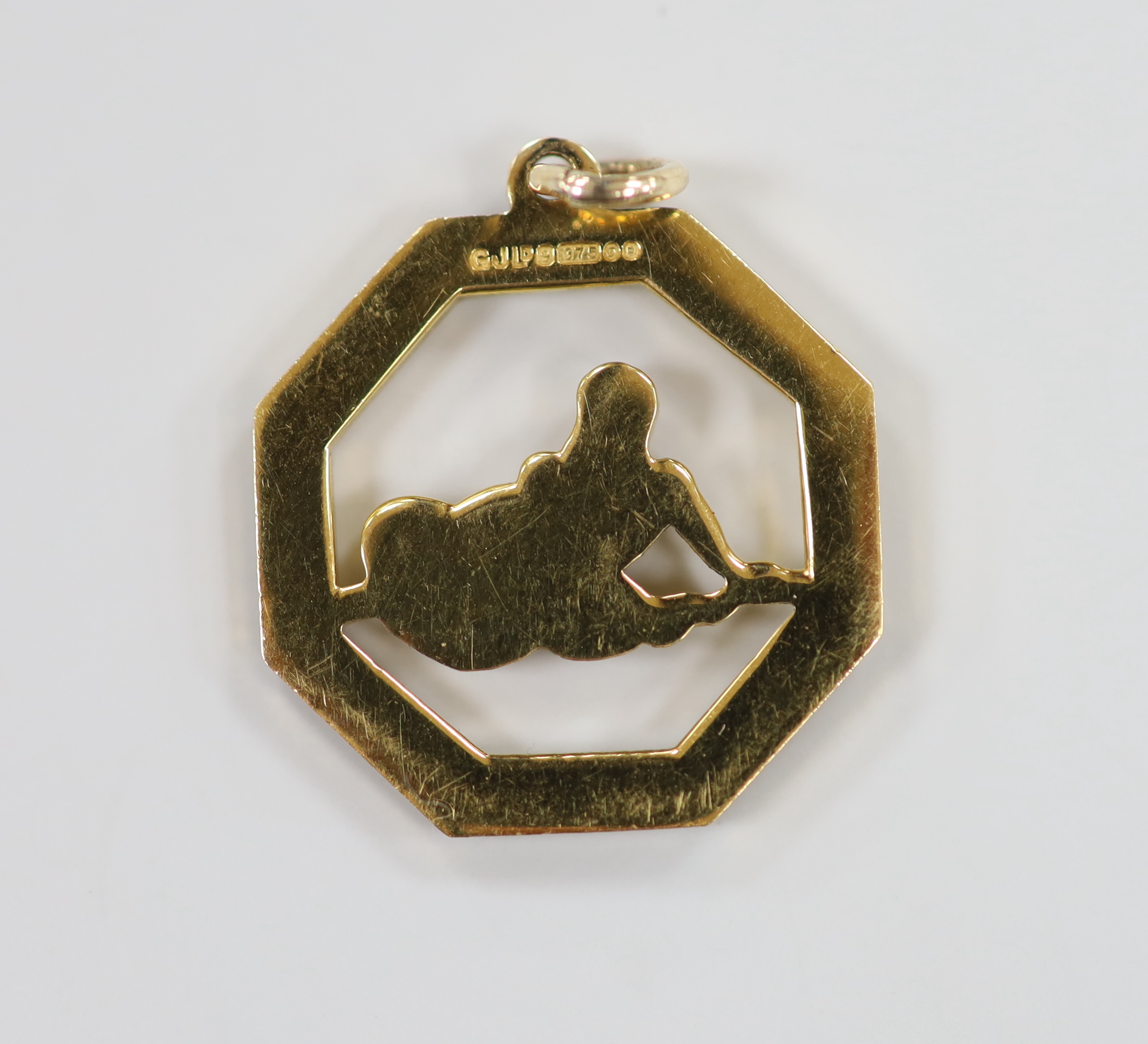 A late 1960's Georg Jensen Ltd 9ct gold octagonal open work pendant, depicting Poseidon?, 21mm, gross weight 3.7 grams.